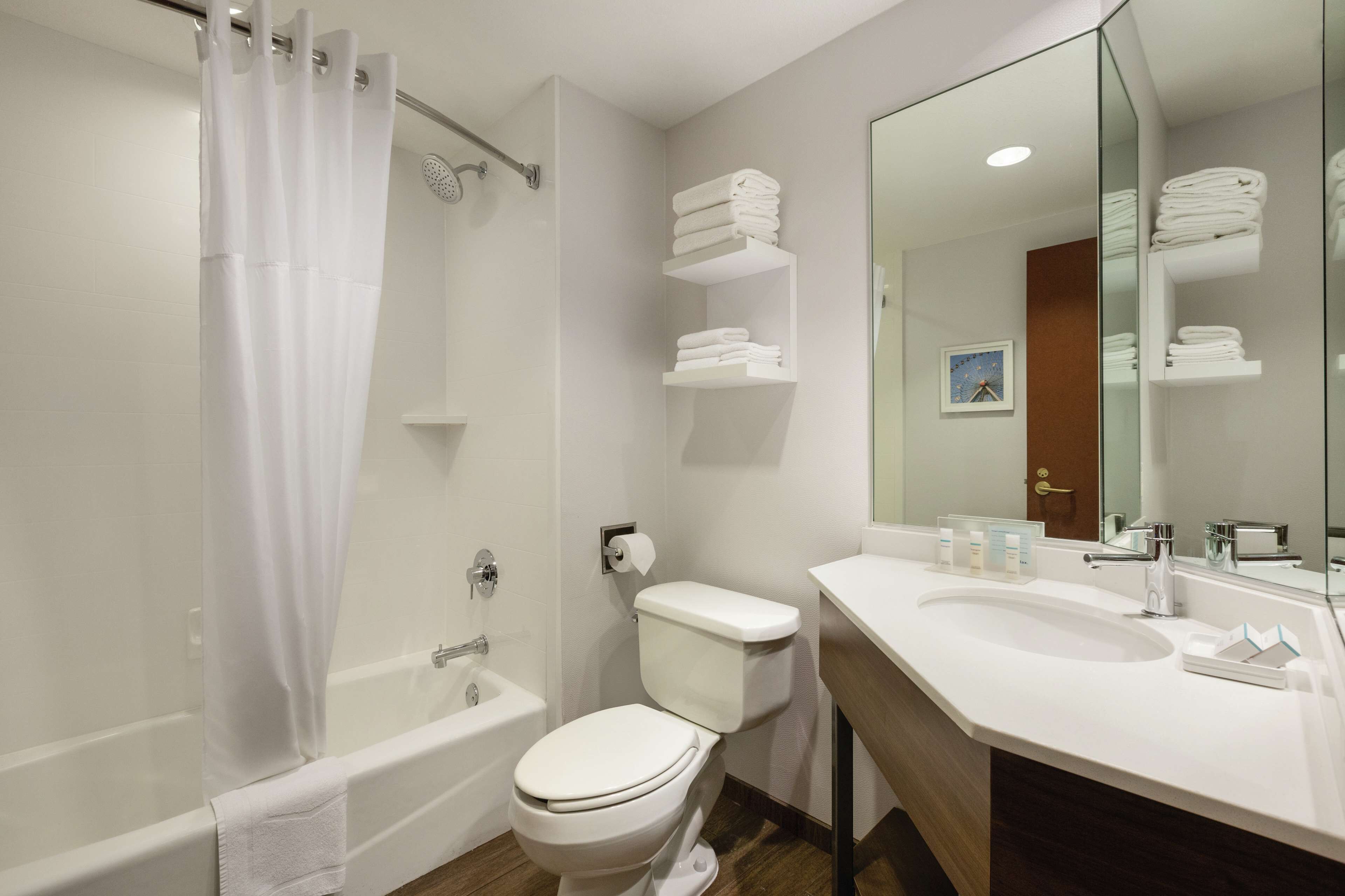 combined shower/bathtub, free toiletries, hair dryer, towels