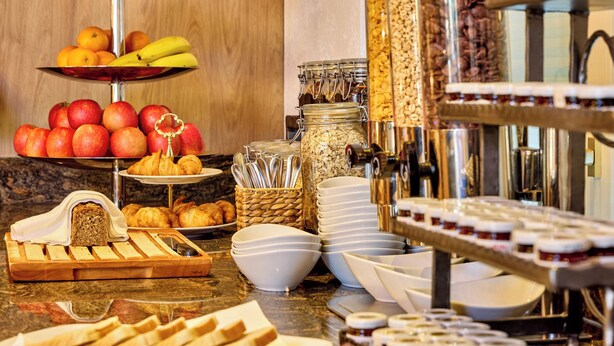 A buffet with fruits, pastries, and breakfast items. - Hotel LinderHof Erfurt (Erfurt)
