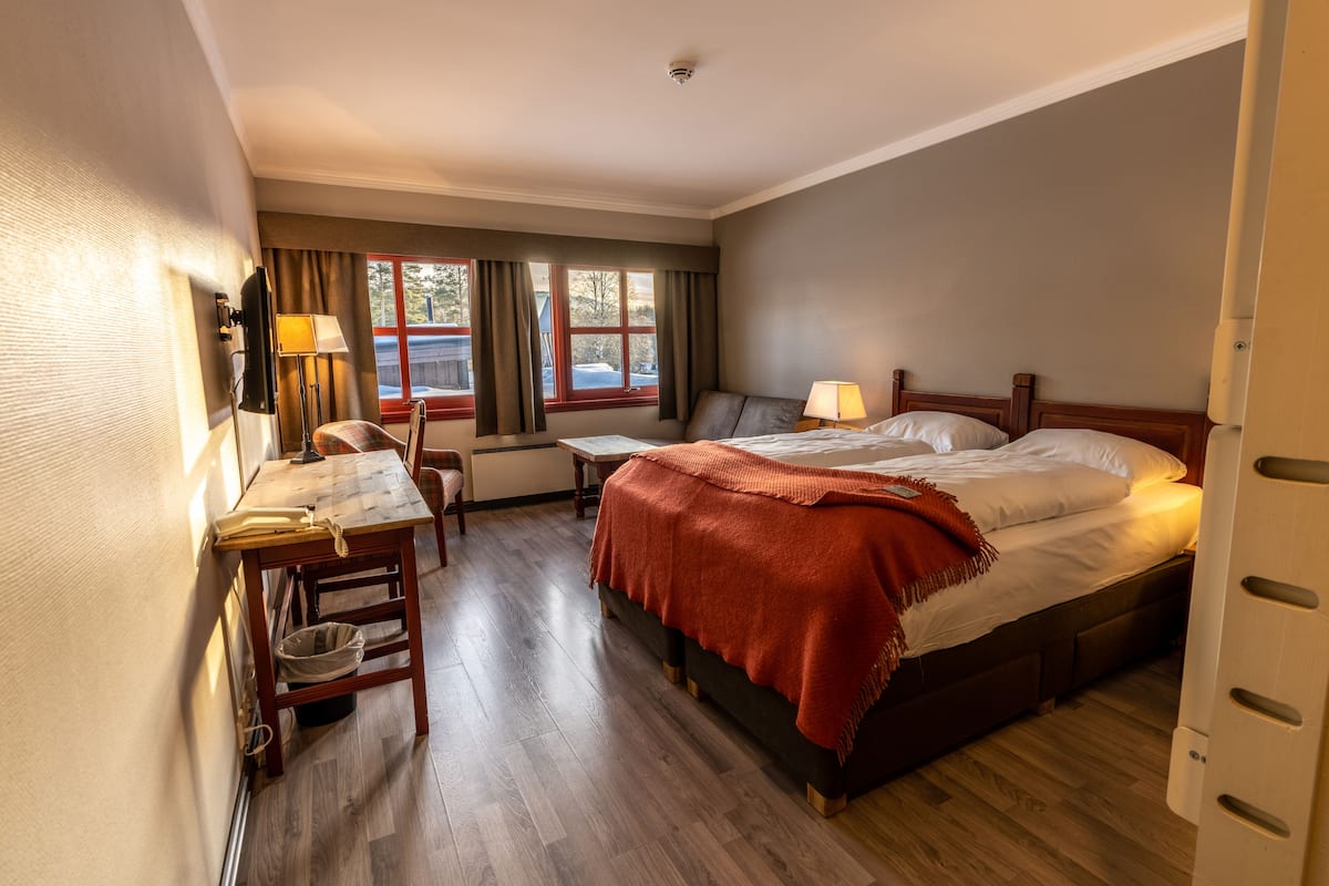 down duvets, pillow-top beds, desk, blackout curtains