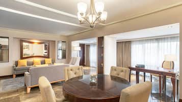 Ambassador Suite | Living area | 26-inch Smart TV with satellite channels, TV