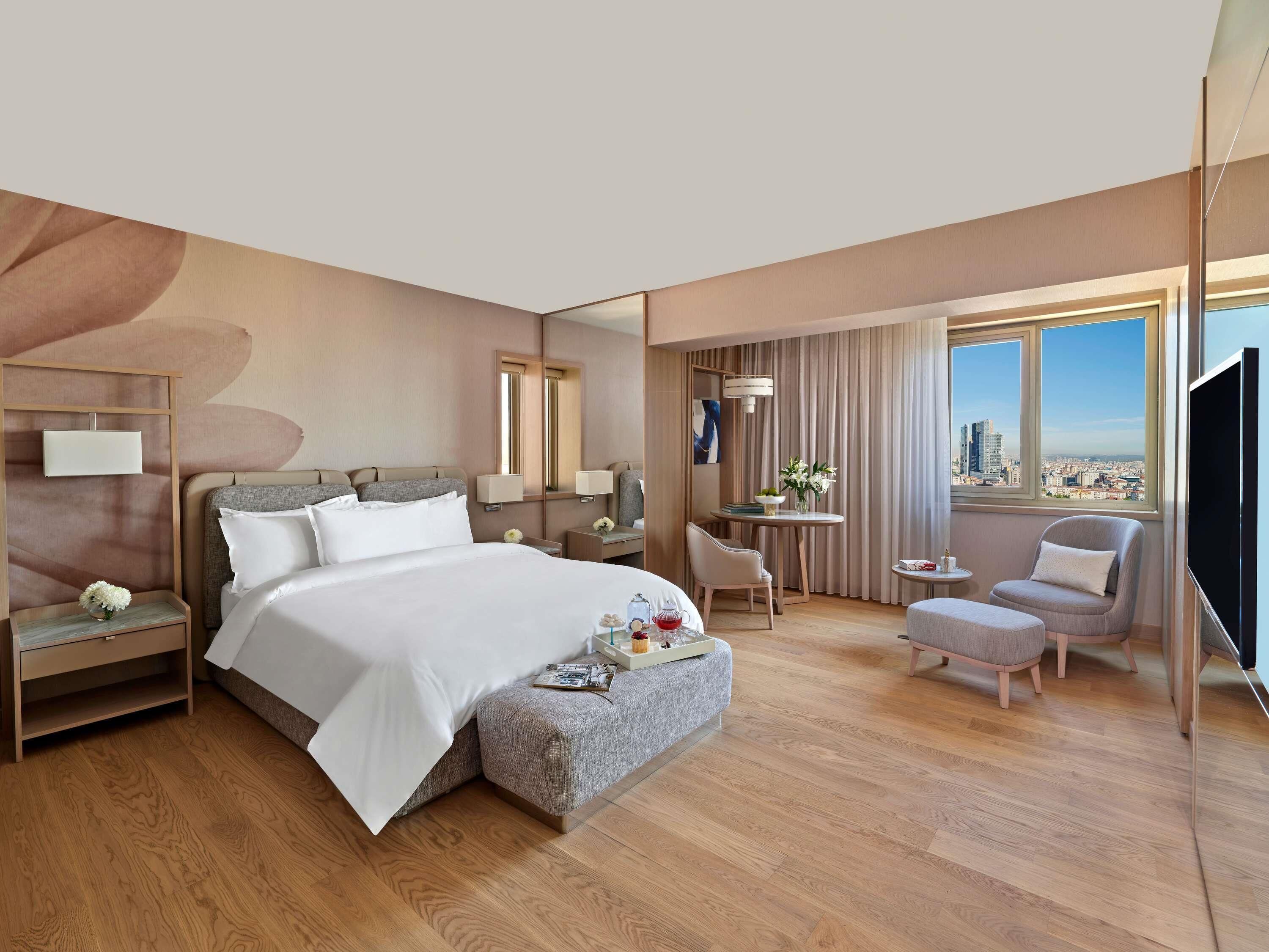 Deluxe Suite, 1 King Bed | Minibar, in-room safe, individually decorated, individually furnished