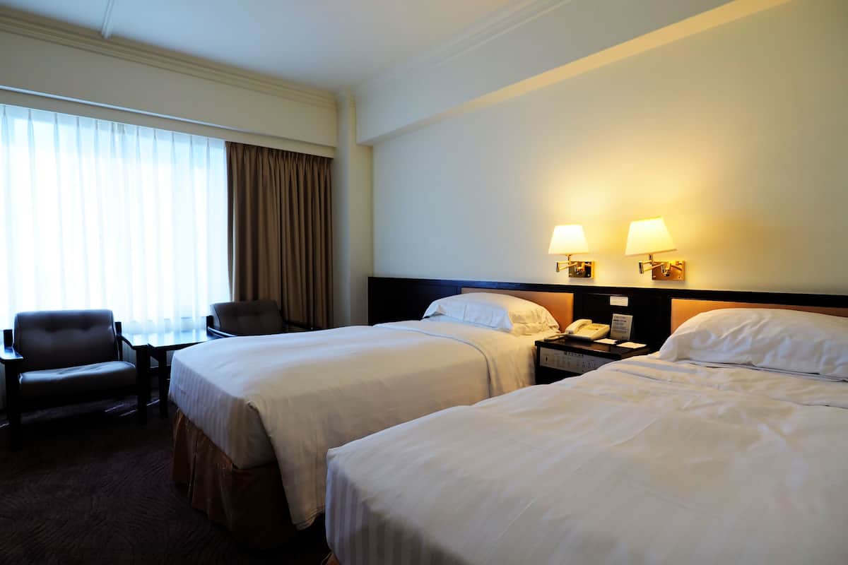 Premium bedding, down duvets, in-room safe, desk