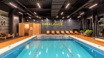 Indoor pool, open 7:00 AM to 10:00 PM, sun loungers