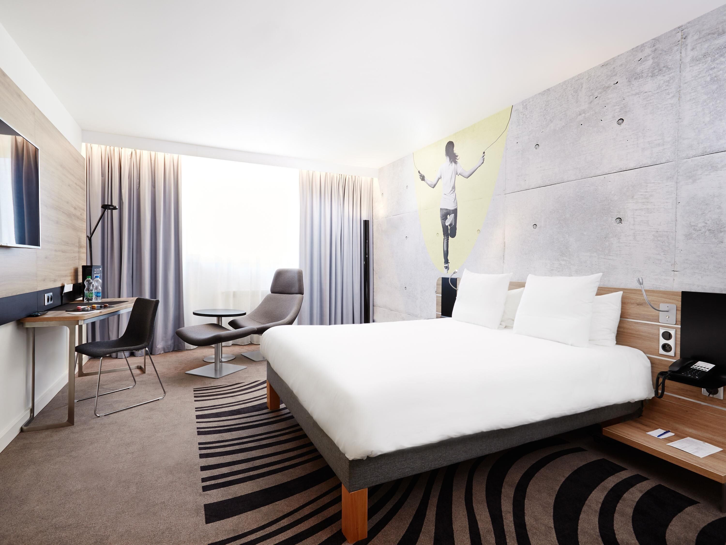 Habitación ejecutiva, 1 cama de matrimonio | Ropa de cama hipoalergénica, minibar, caja fuerte y escritorio