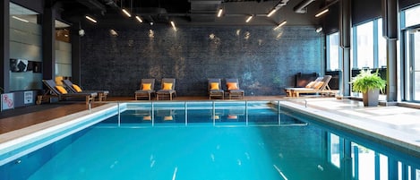 Indoor pool, open 7:00 AM to 10:00 PM, pool loungers