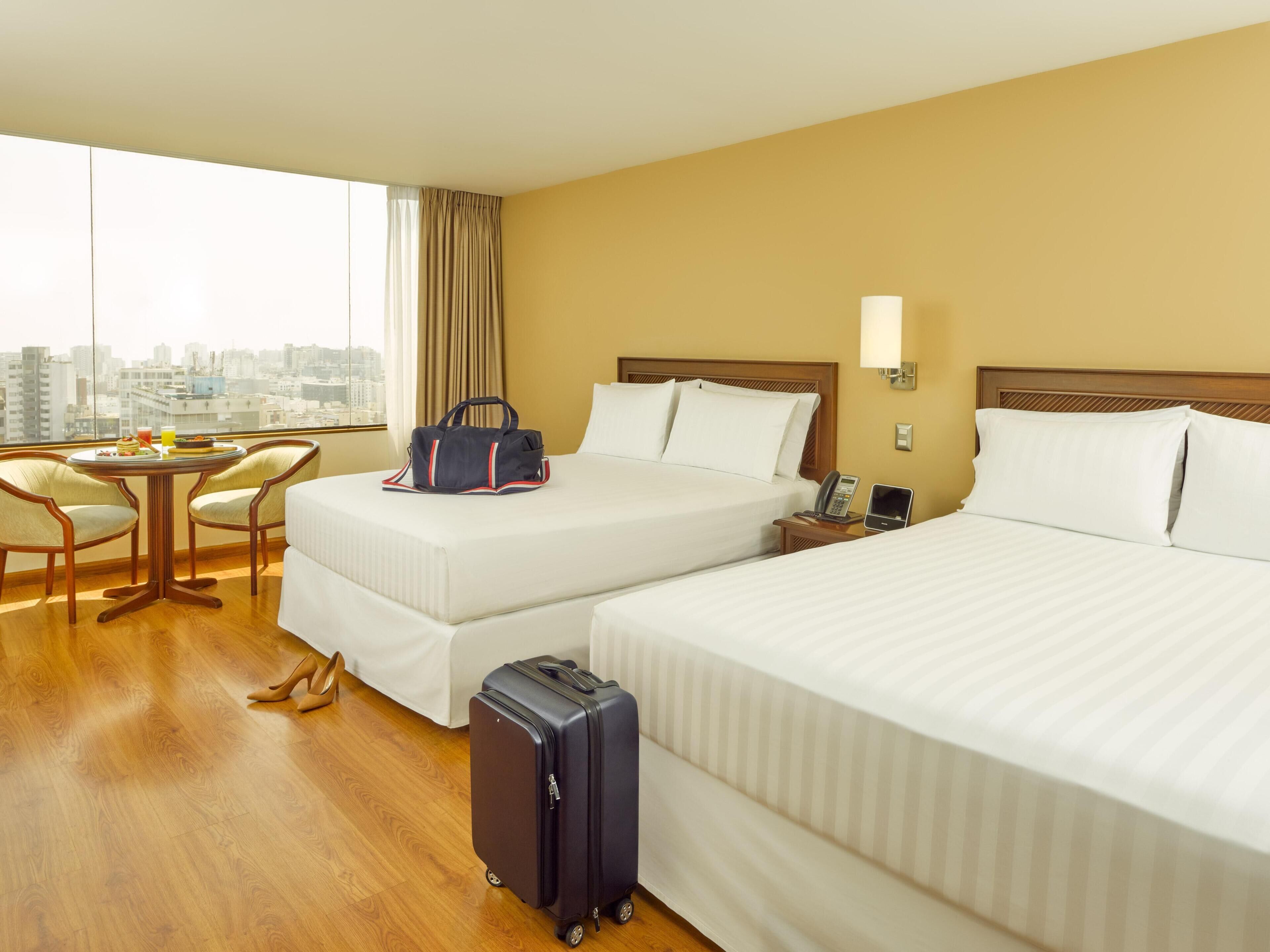 Premium bedding, down comforters, memory foam beds, minibar