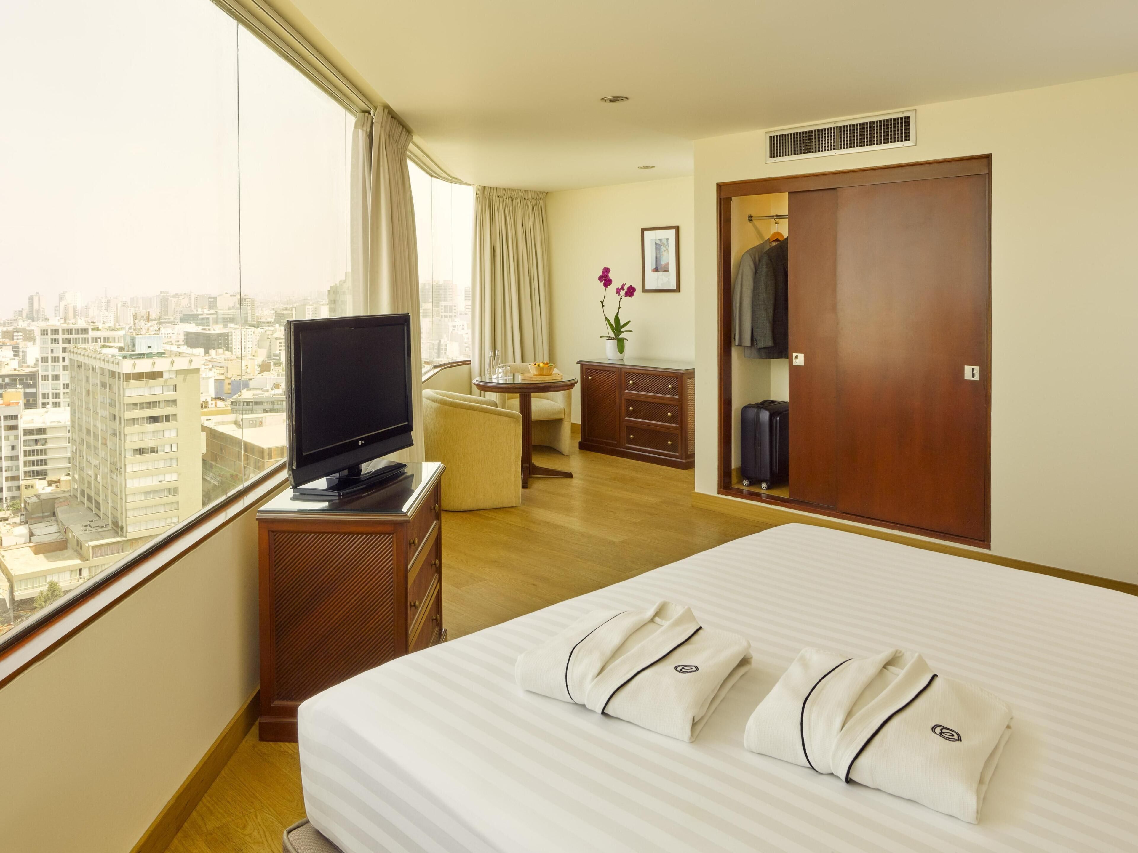 Premium bedding, down comforters, memory foam beds, minibar