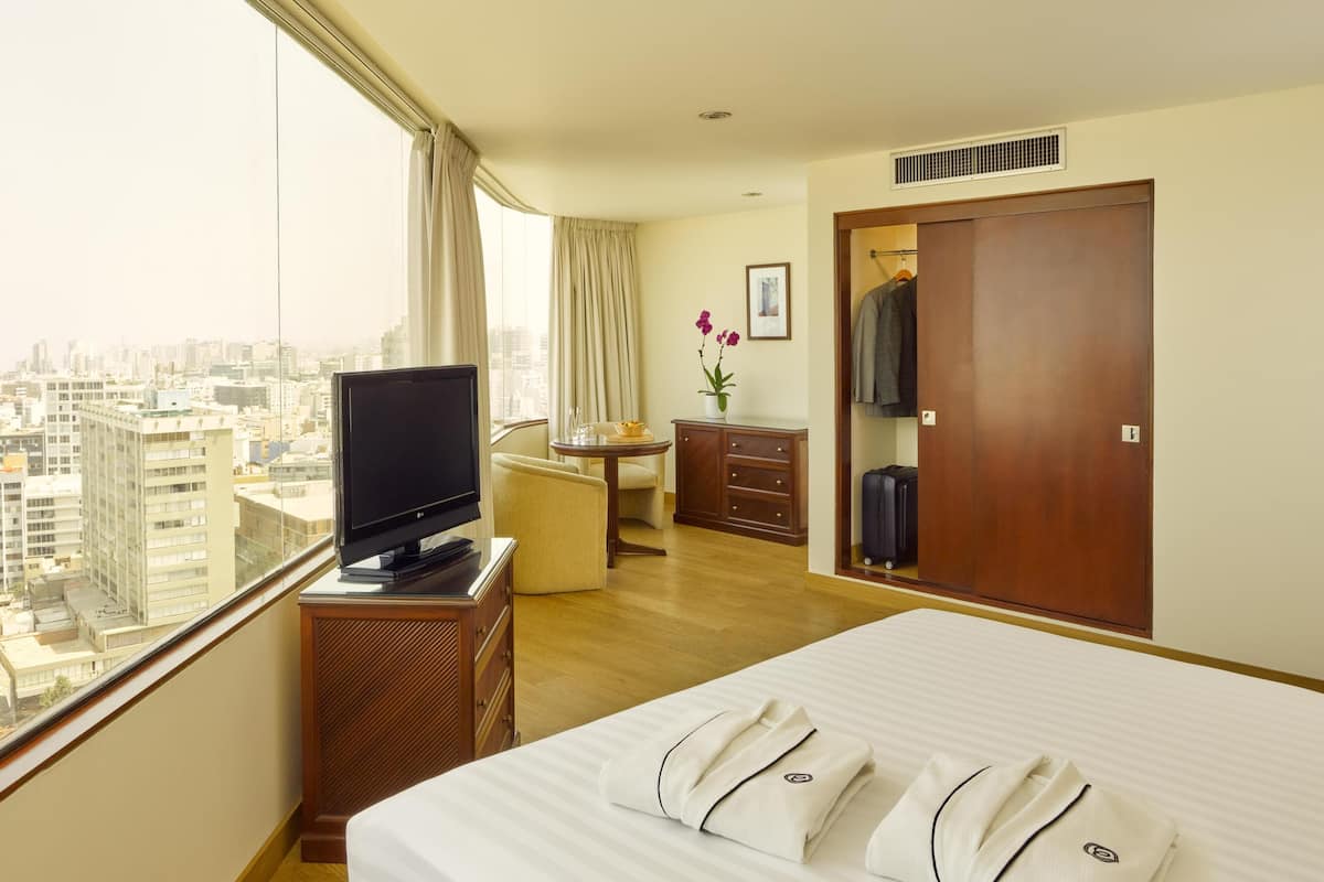 Premium bedding, down comforters, memory foam beds, minibar