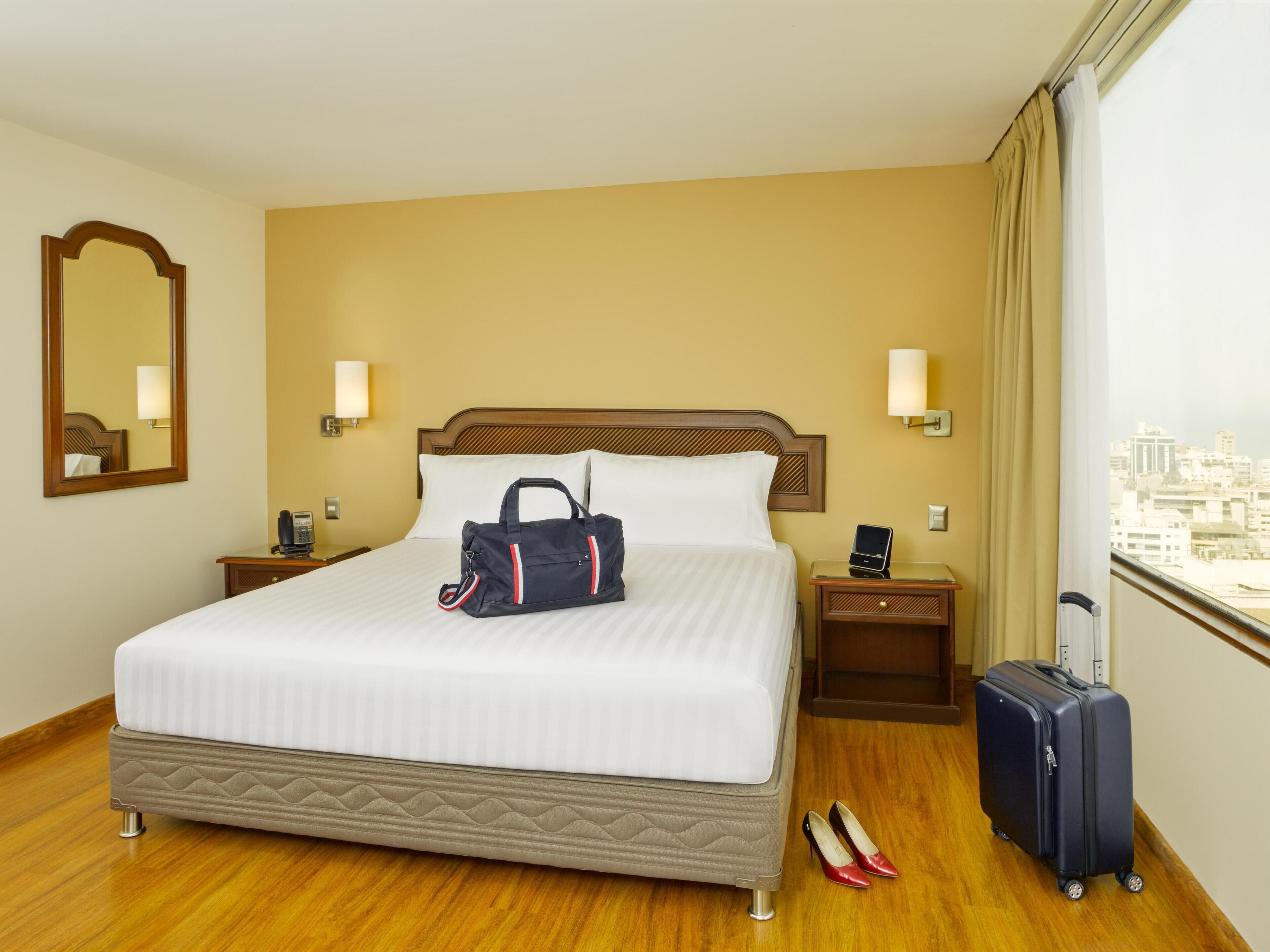 Premium bedding, down comforters, memory foam beds, minibar
