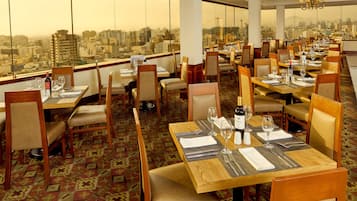Breakfast, lunch served; local and international cuisine, sea views