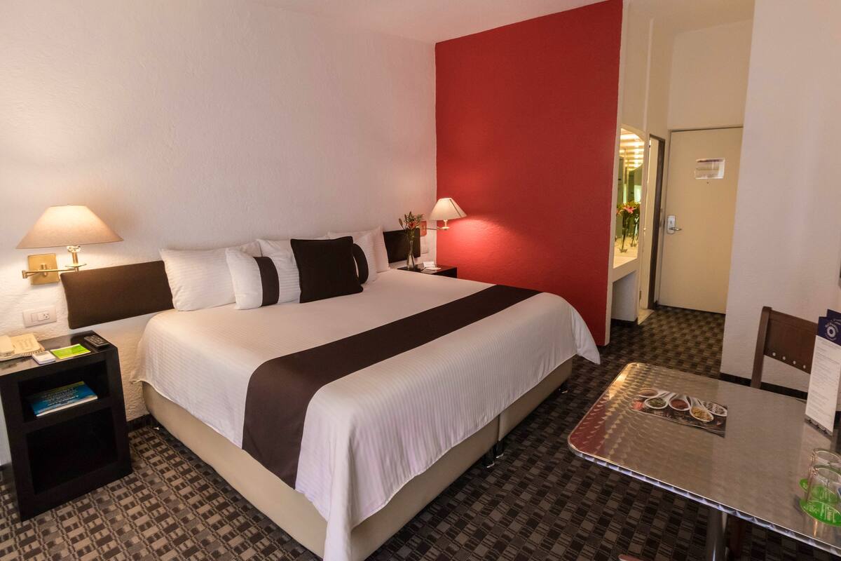 Premium bedding, down comforters, in-room safe, desk
