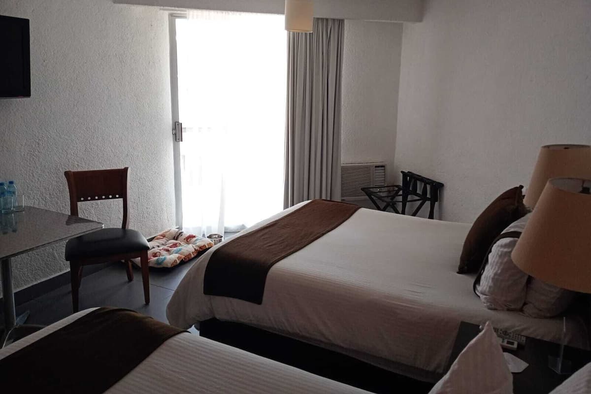 Premium bedding, down duvets, in-room safe, desk