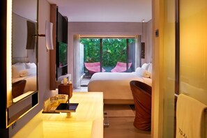 A hotel room with a bed, bedside table, and a view of greenery outside. - Naumi Hotel Singapore (Singapore)