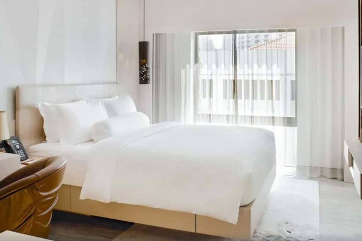 Egyptian cotton sheets, premium bedding, free minibar, in-room safe