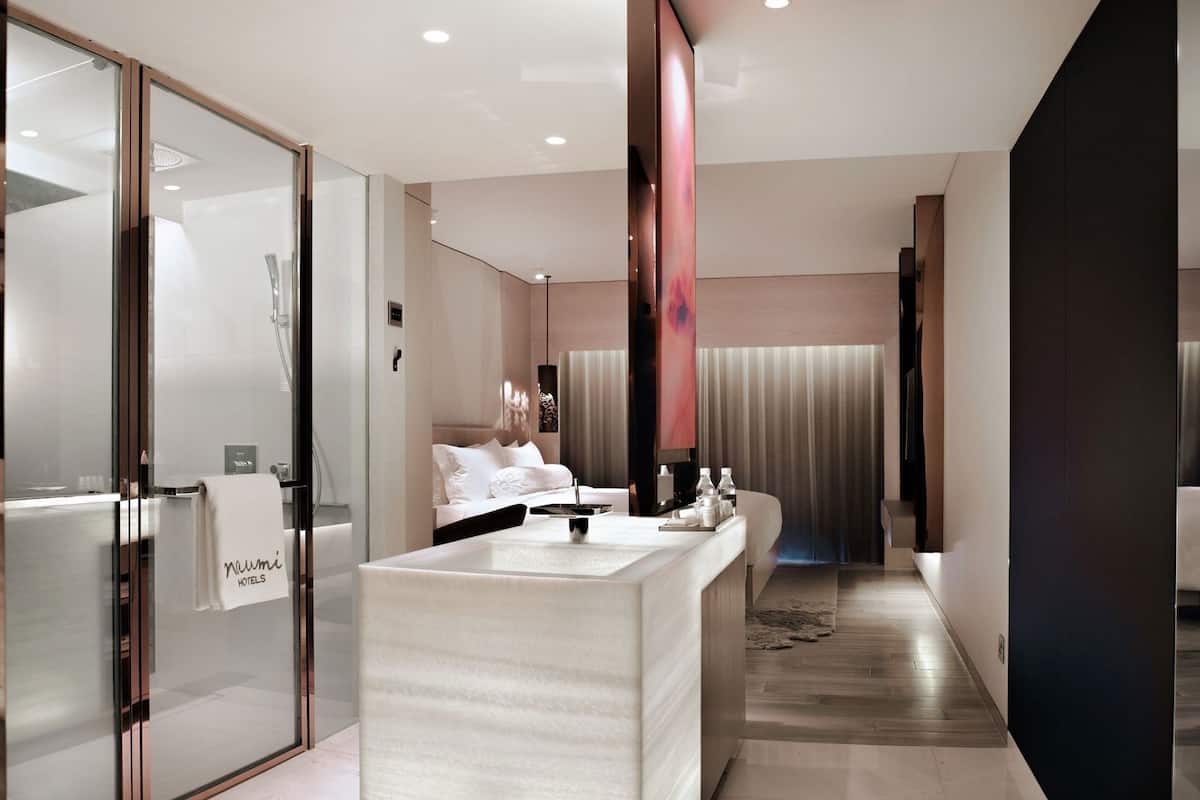 Egyptian cotton sheets, premium bedding, free minibar, in-room safe