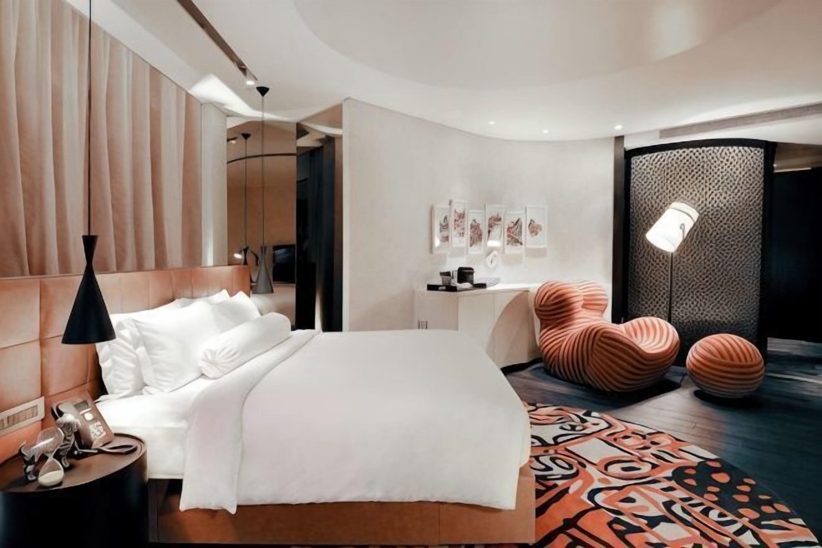 Egyptian cotton sheets, premium bedding, free minibar, in-room safe