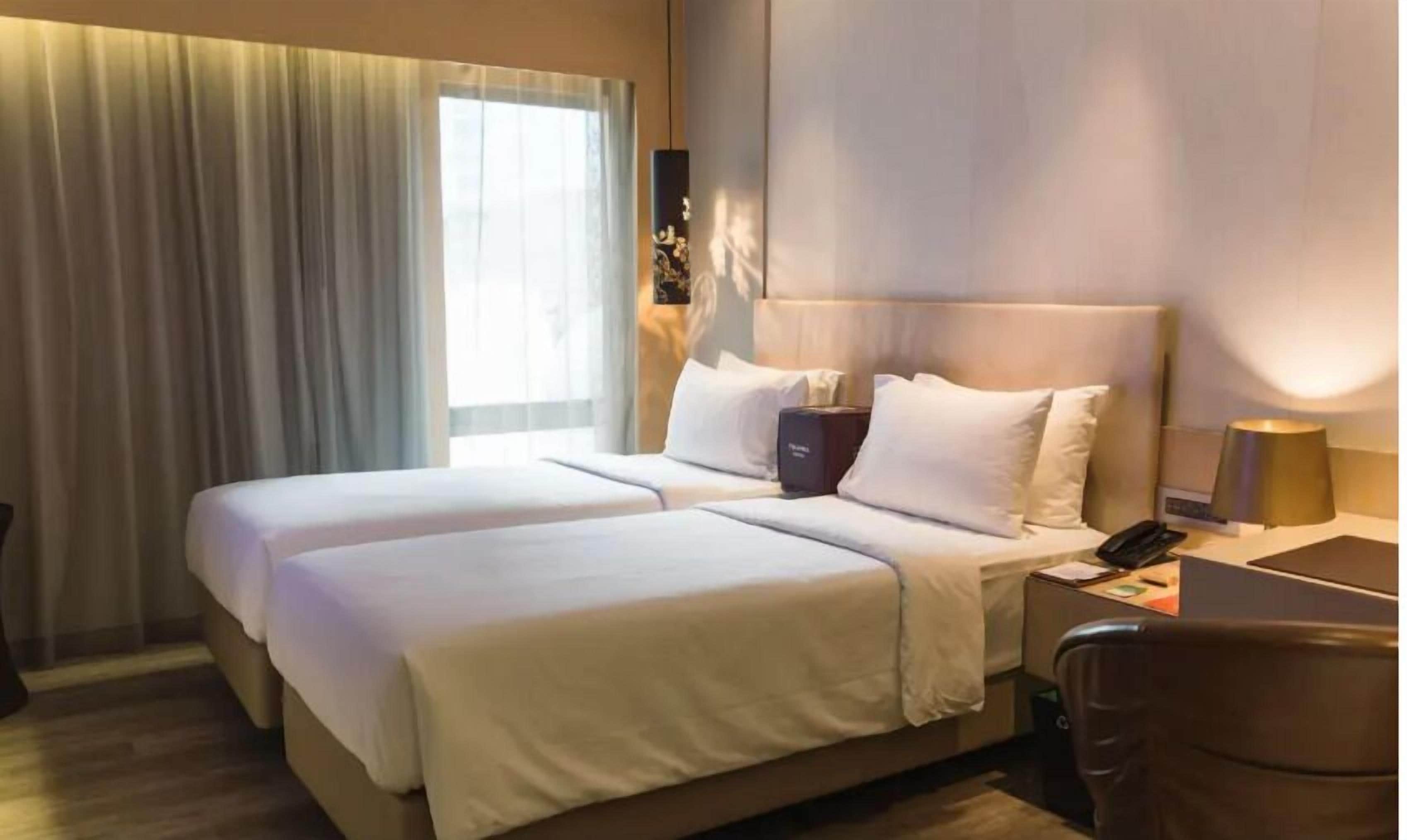 Egyptian cotton sheets, premium bedding, free minibar, in-room safe