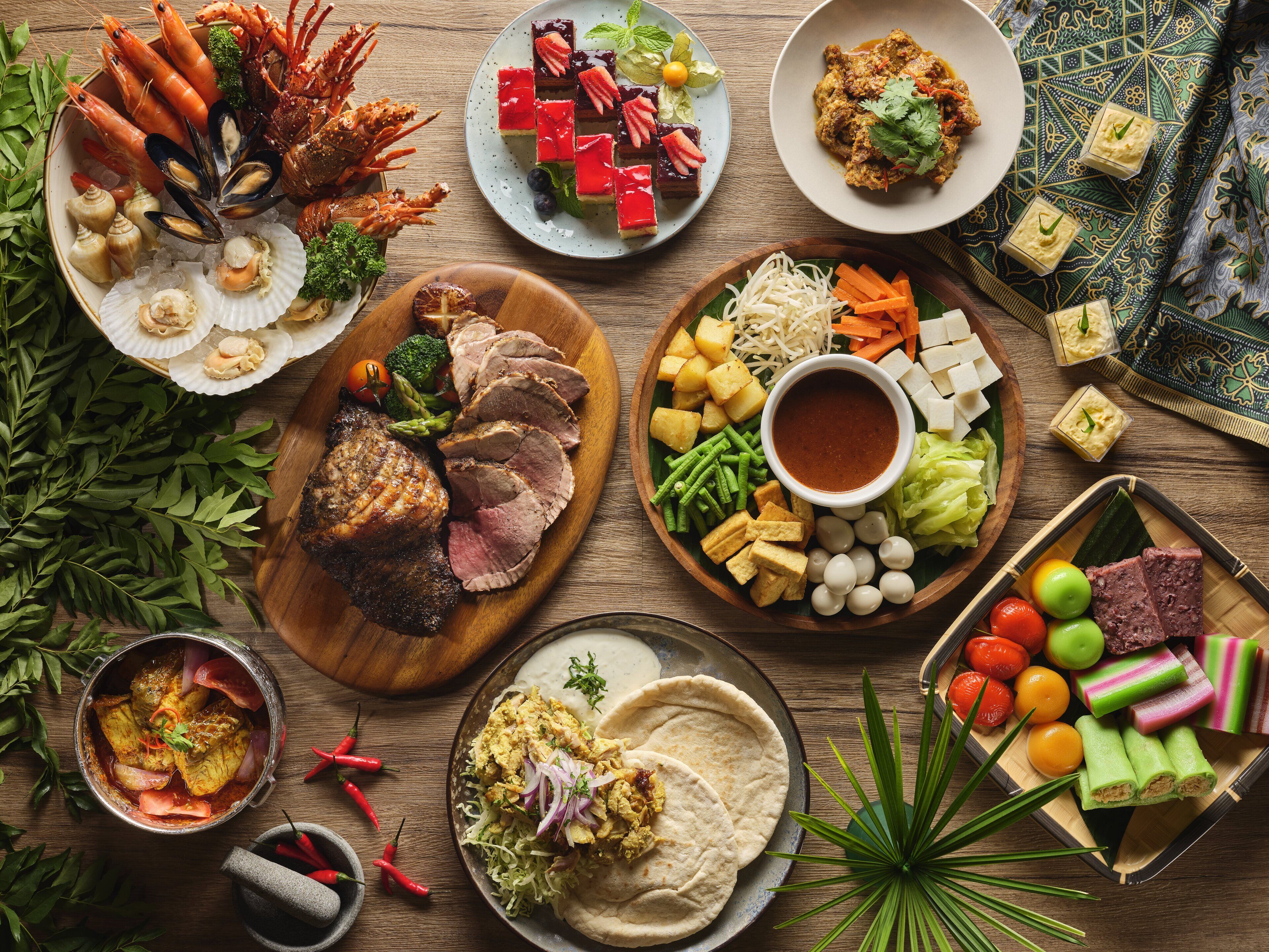 A variety of dishes including seafood, vegetables, and meats, suggesting a diverse culinary selection.