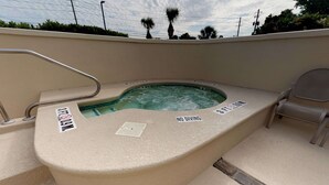 A hot tub with a 'NO DIVING' sign, a 3 FT depth warning, and a '3 FT' depth limit. - Hampton Inn St. Simons Island (St. Simons Island)