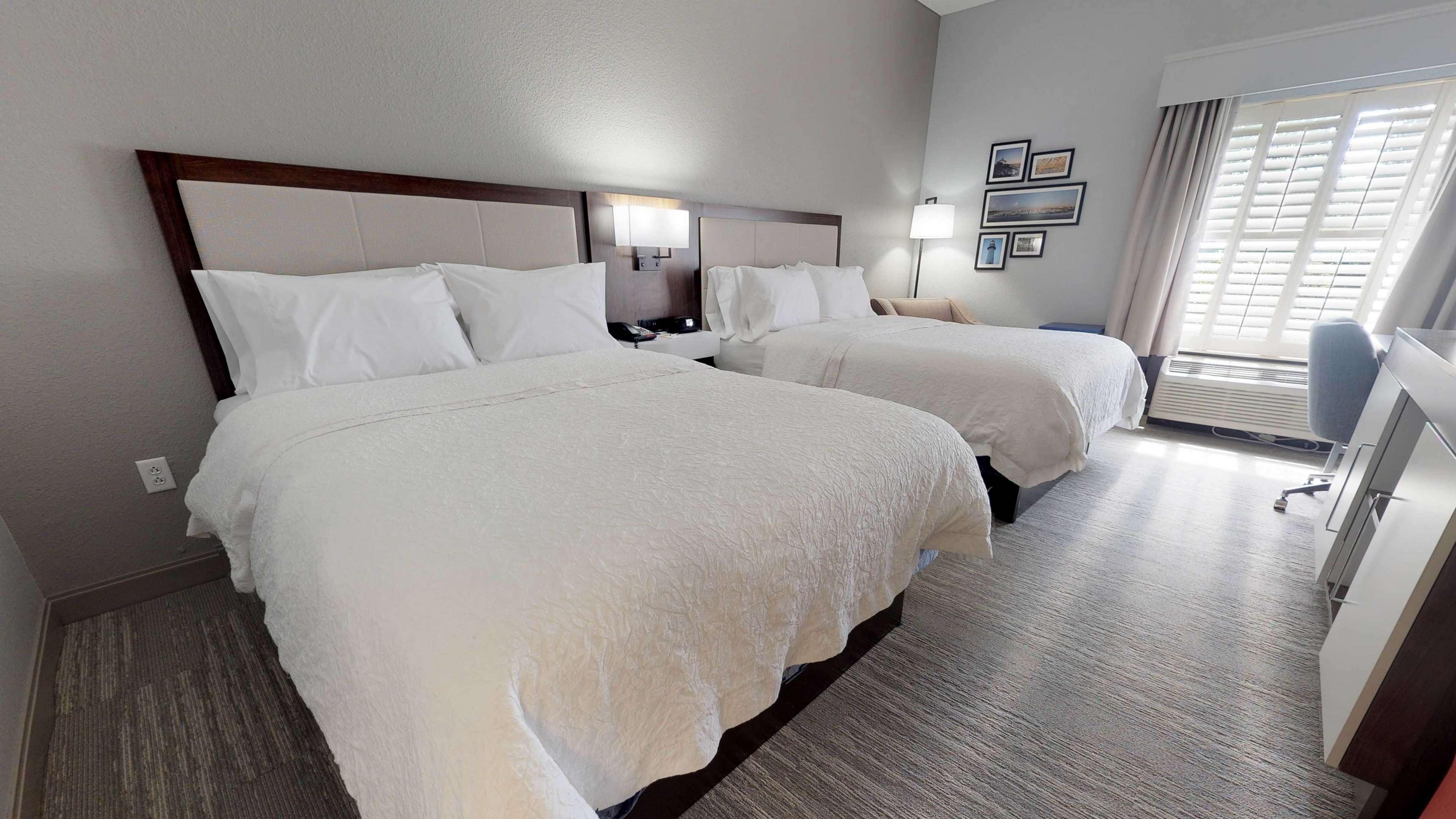 room, 2 queen beds, non smoking | in-room safe, desk, iron/ironing board, cots/infant beds