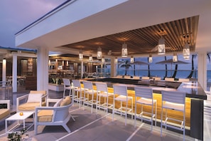 4 bars/lounges, poolside bar