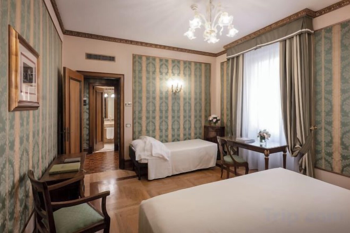 Premium bedding, down comforters, minibar, in-room safe