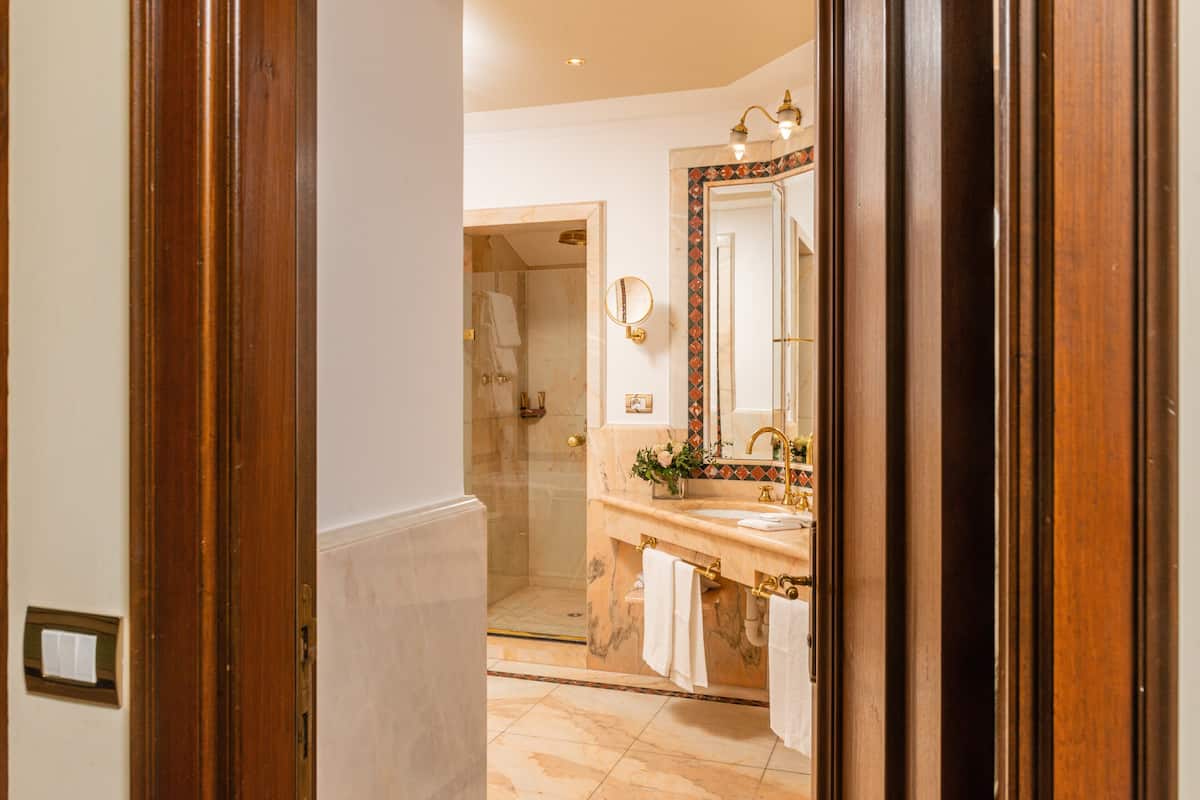 jetted bath, free toiletries, hair dryer, bathrobes