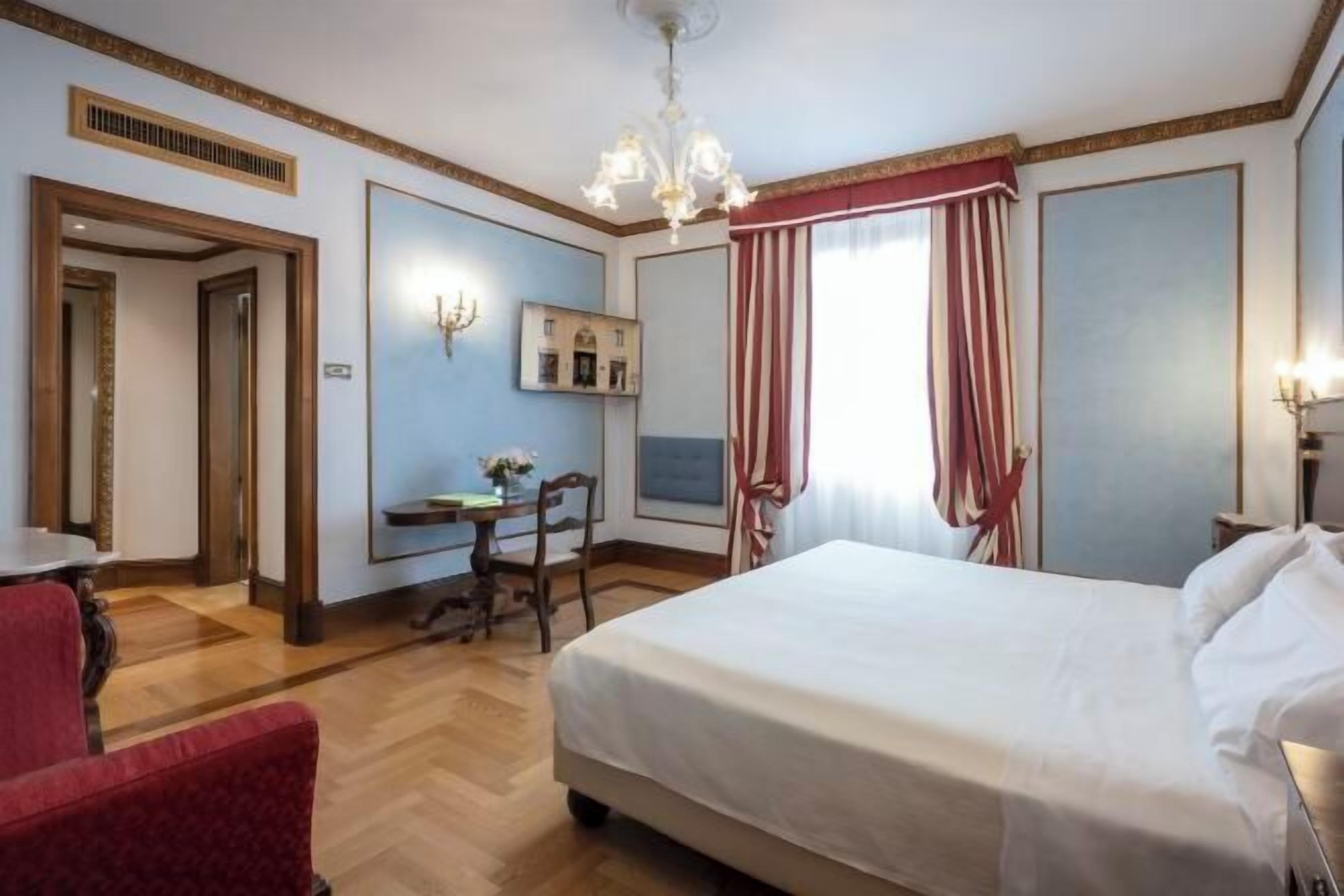 Premium bedding, down comforters, minibar, in-room safe