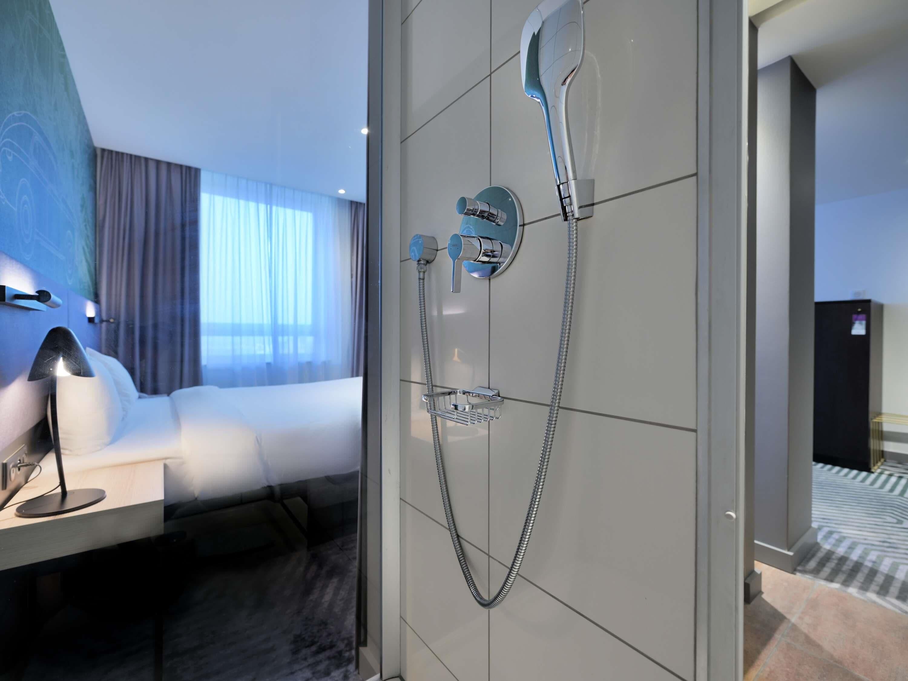 Superior Room | Bathroom | Shower, rainfall showerhead, eco-friendly toiletries, hair dryer