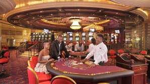 A casino floor with blackjack tables, red chairs, and slot machines. - Peermont Walmont at Graceland, Secunda (Secunda)