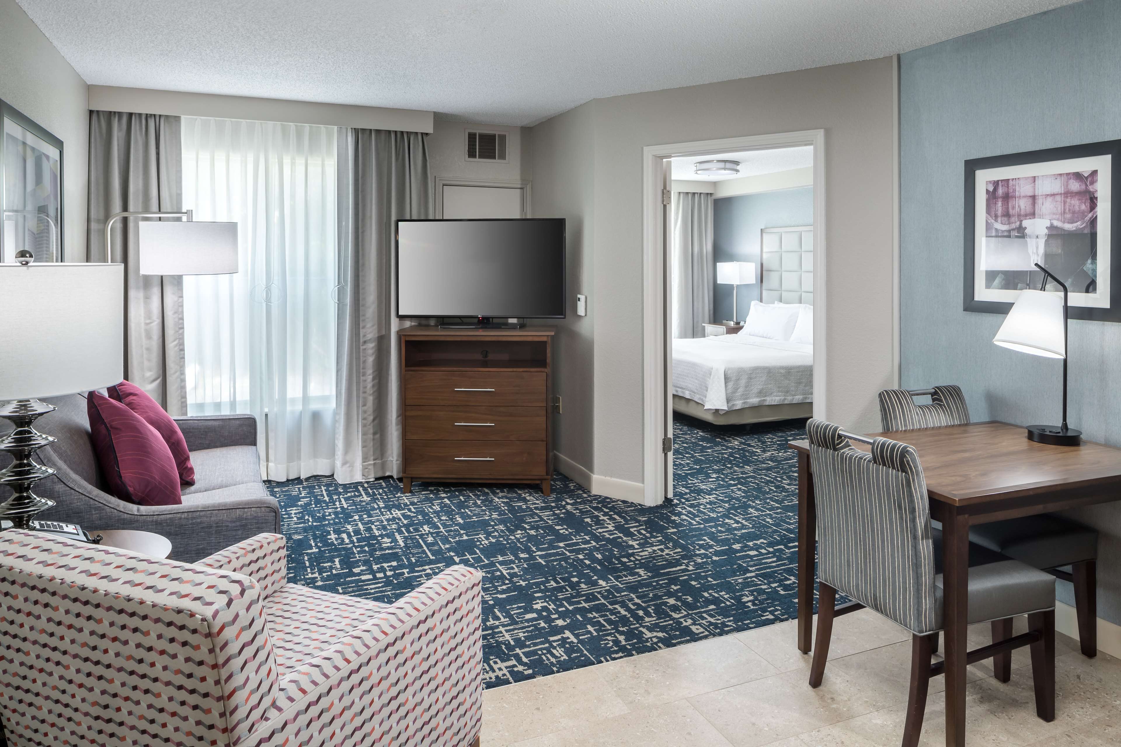 suite, 2 queen beds, accessible, bathtub (mobility & hearing) | living area | lcd tv