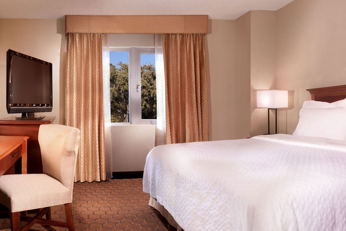 Premium bedding, down comforters, pillowtop beds, in-room safe
