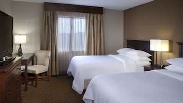 Premium bedding, down duvets, pillow-top beds, in-room safe