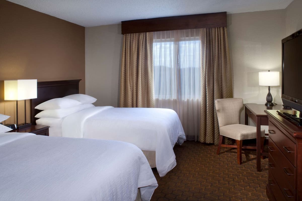 Premium bedding, down comforters, pillowtop beds, in-room safe