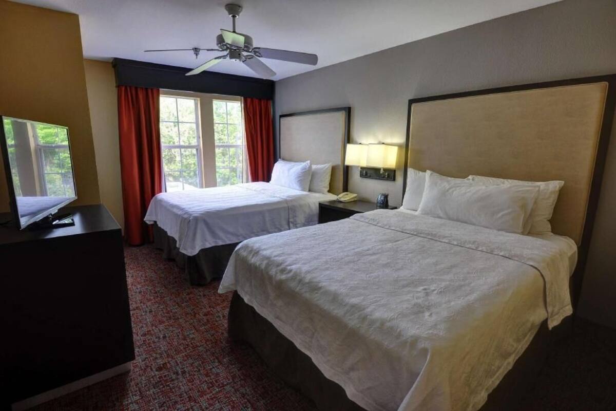 Desk, laptop workspace, blackout drapes, soundproofing