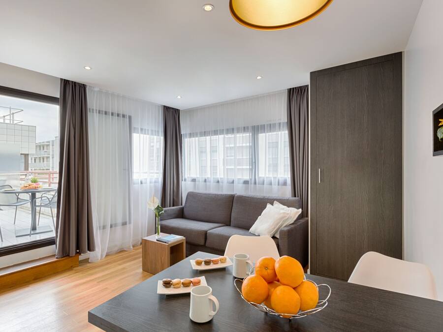 Apartment, 1 Bedroom | Living room | Flat-screen TV