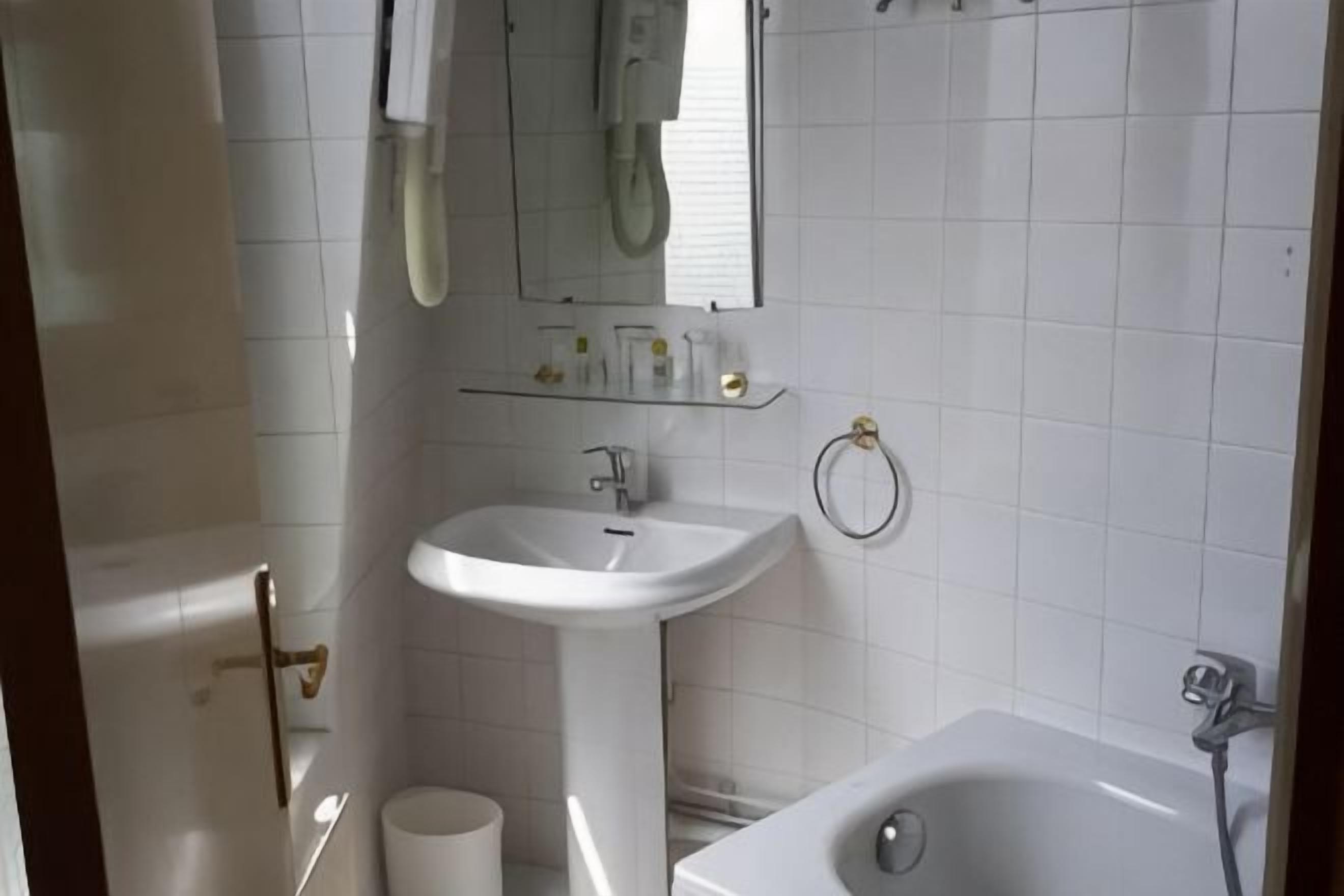 Ducha, secador de pelo, toallas