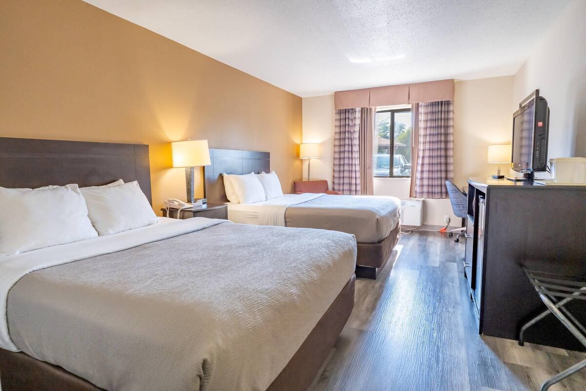 Standard Room, 2 Queen Beds, Non Smoking | Laptop workspace, iron/ironing board, WiFi (free), alarm clocks
