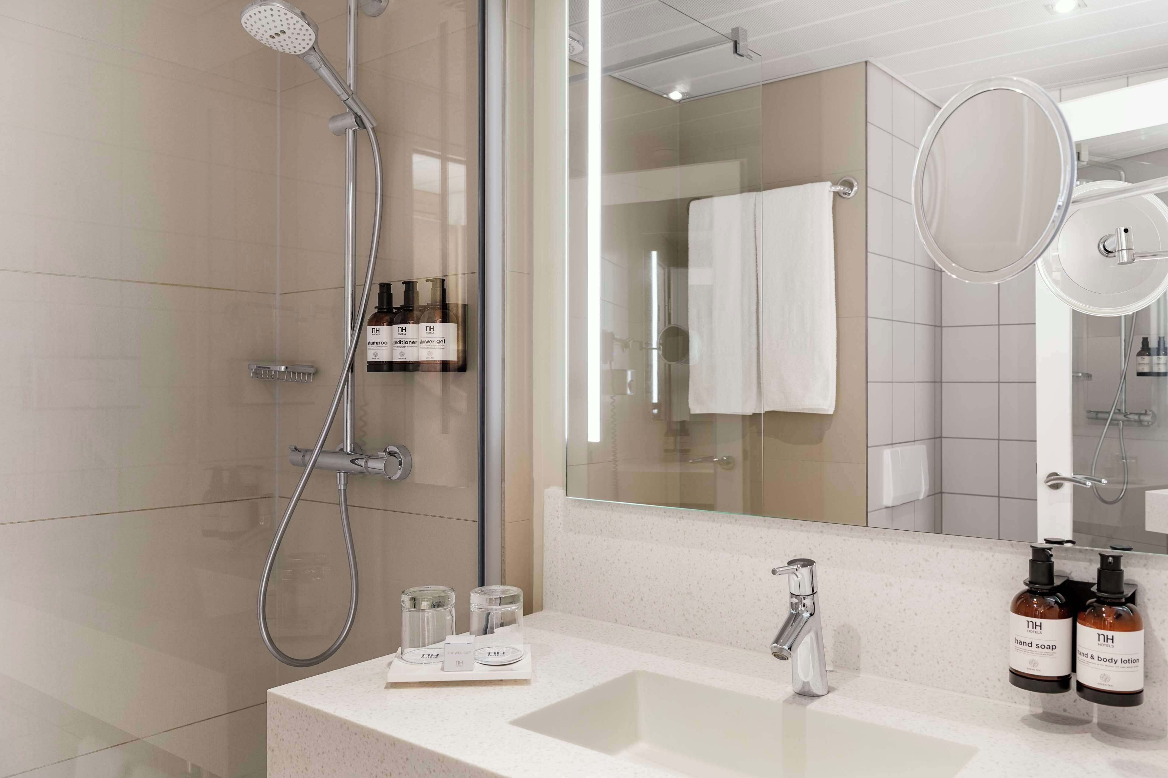 eco-friendly toiletries, hair dryer, towels