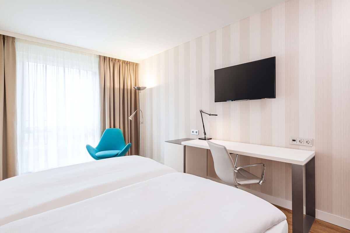Premium bedding, in-room safe, desk, soundproofing