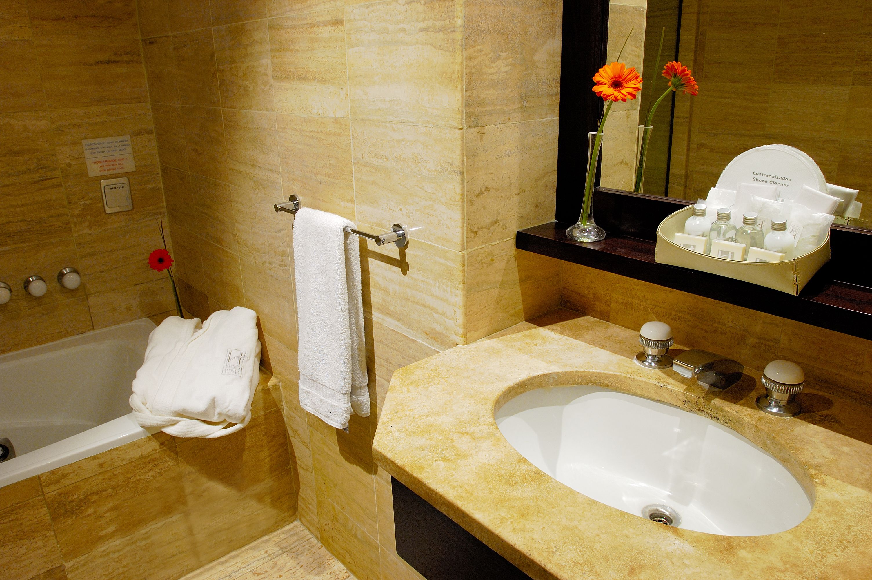 combined shower/bathtub, rainfall showerhead, designer toiletries