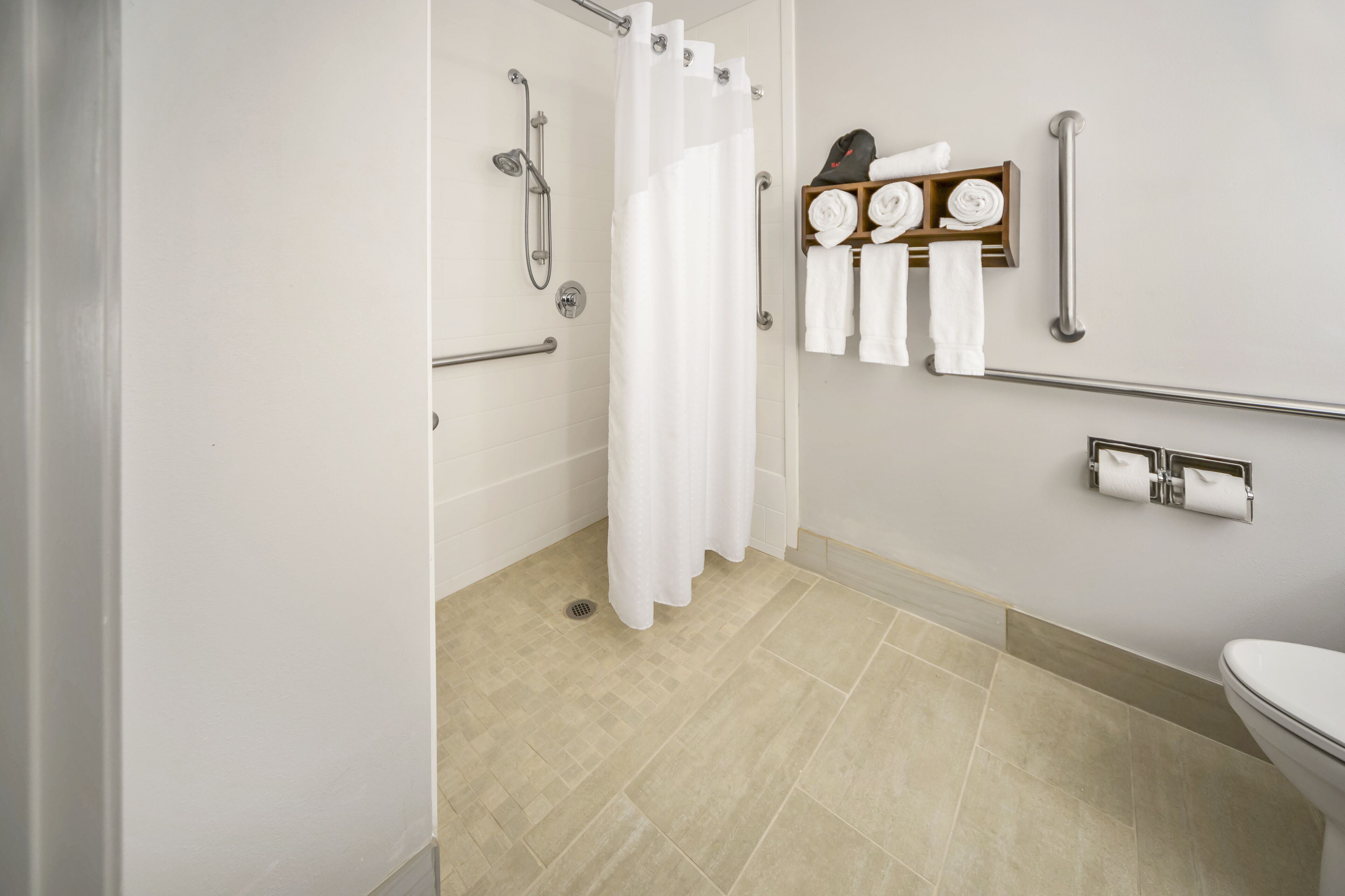 room, 1 king bed, accessible (communications, roll-in shower) | 1 bedroom, in-room safe, desk, blackout curtains