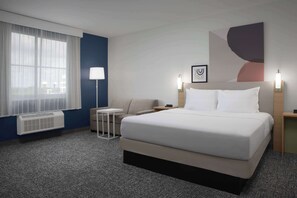 Room, 1 King Bed with Sofa bed | Living area | 55-inch Smart TV with cable channels, Netflix, Hulu