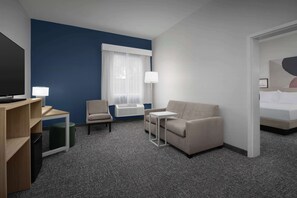 Suite, 1 King Bed | Living area | 55-inch Smart TV with cable channels, Netflix, Hulu