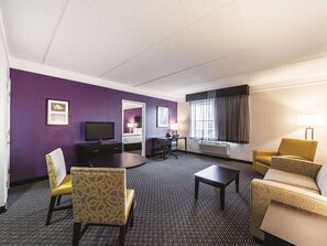 Deluxe Suite, 1 King Bed, Non Smoking | Pillowtop beds, desk, laptop workspace, blackout drapes