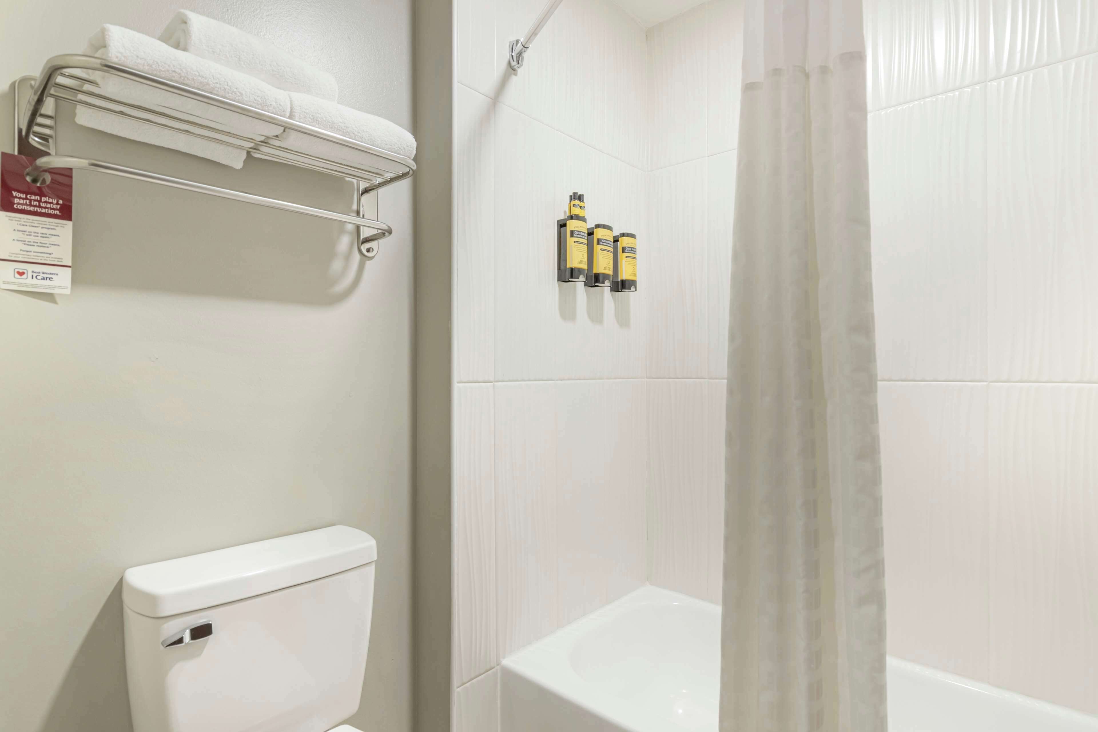 junior suite, 2 queen beds, non smoking, microwave | bathroom | free toiletries, hair dryer, towels, soap