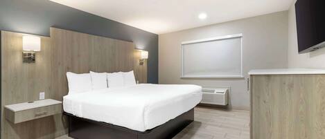 Suite, 1 King Bed, Non Smoking (with Sofabed) | Pillowtop beds, in-room safe, desk, laptop workspace