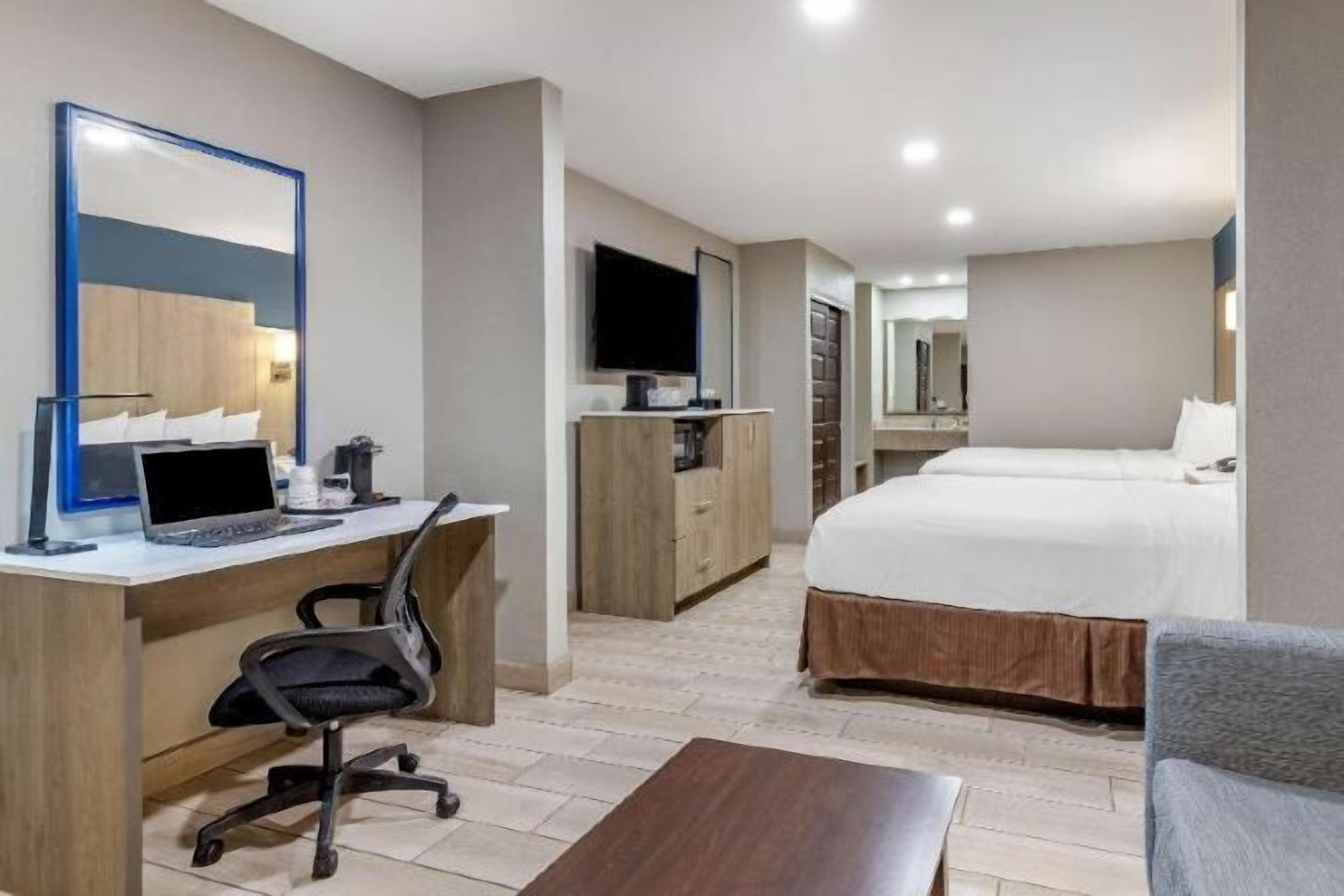 Pillowtop beds, in-room safe, desk, laptop workspace