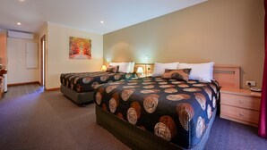 A double room with two beds, a desk, and a chair. - Westland Hotel Motel (Whyalla Norrie)