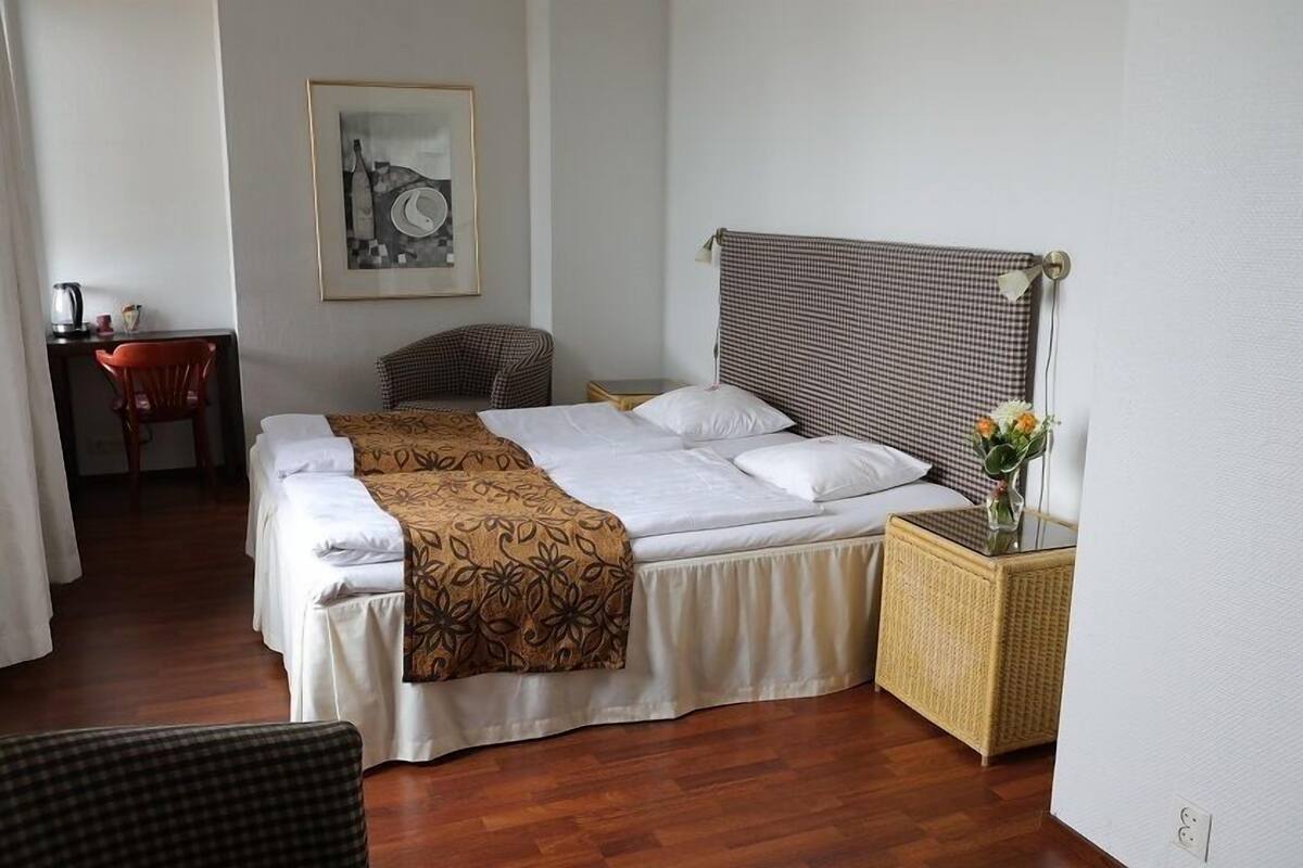 Standaard Twin kamer | Een strijkplank/strijkijzer, gratis wifi, beddengoed